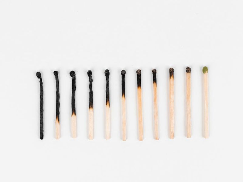 A sequence of minimalist icons showing a person's progression in an exercise.